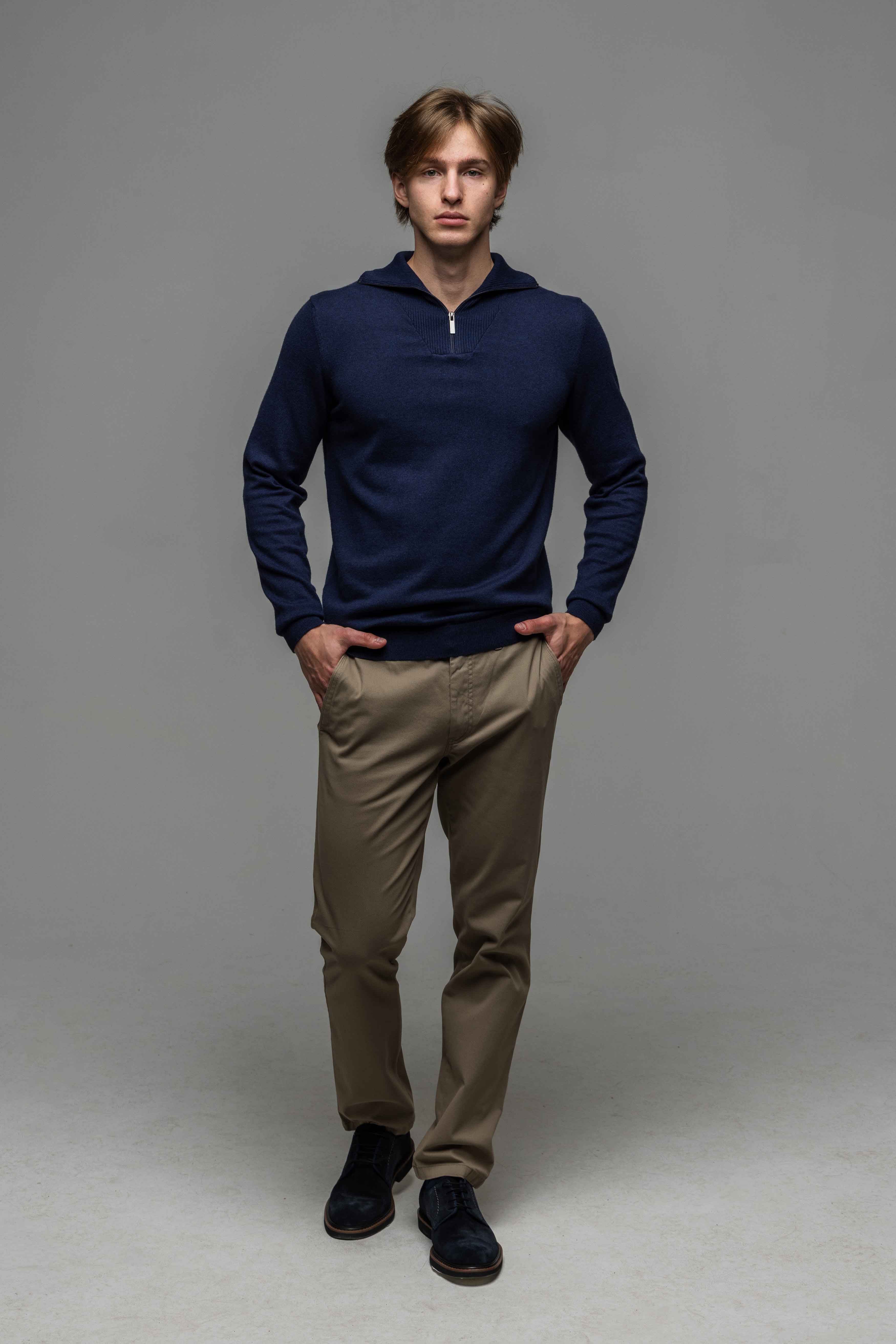 blue dress pants grey sweater Men's Outfit: Beige Cowl-neck Sweater, Blue Long Sleeve Shirt, Grey Dress Pants, Charcoal Suede Boat Shoes