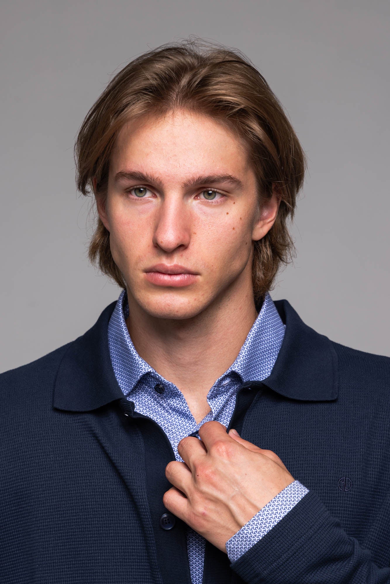 Navy blue wool button-up sweater