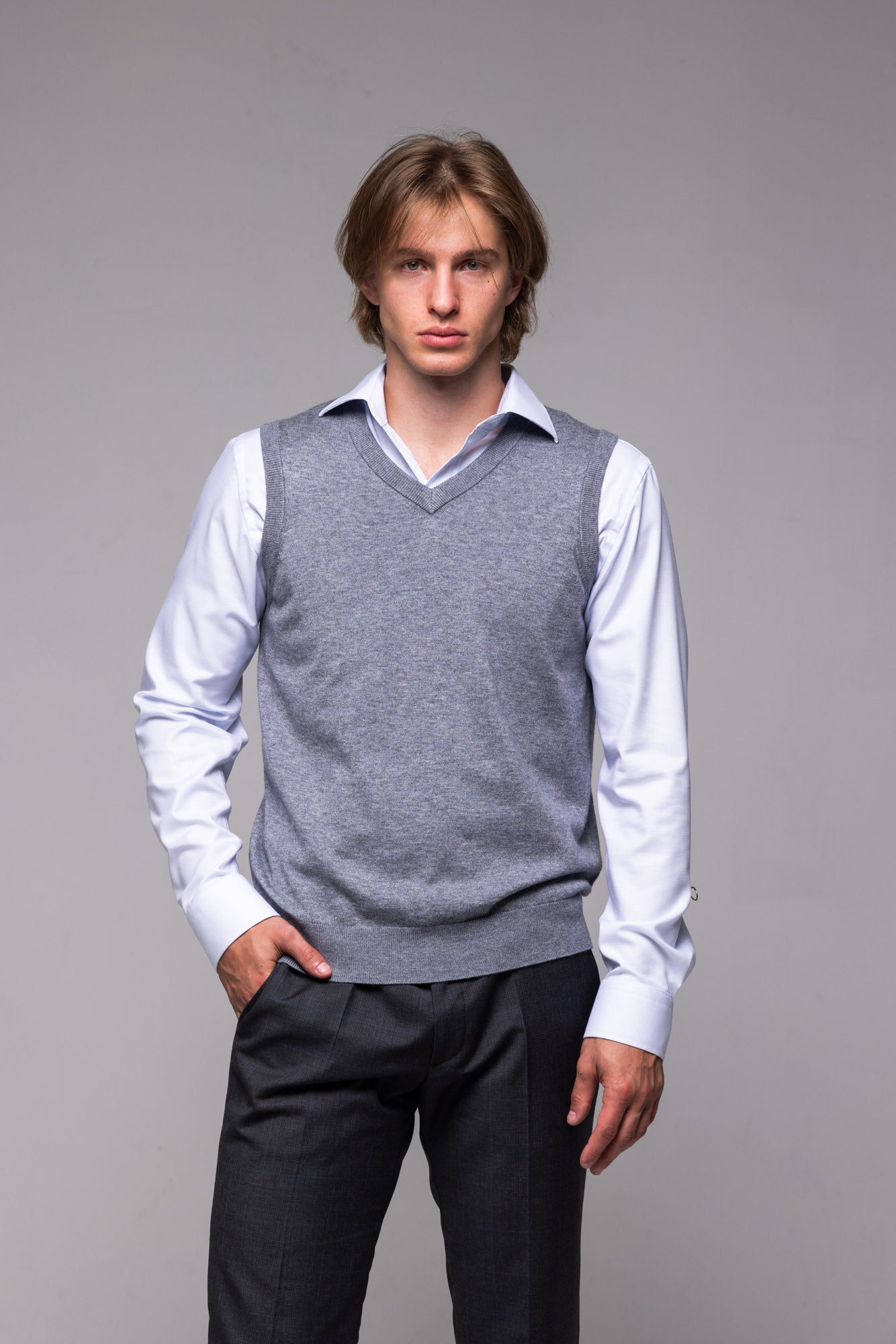Grey knitted vest with V-neck