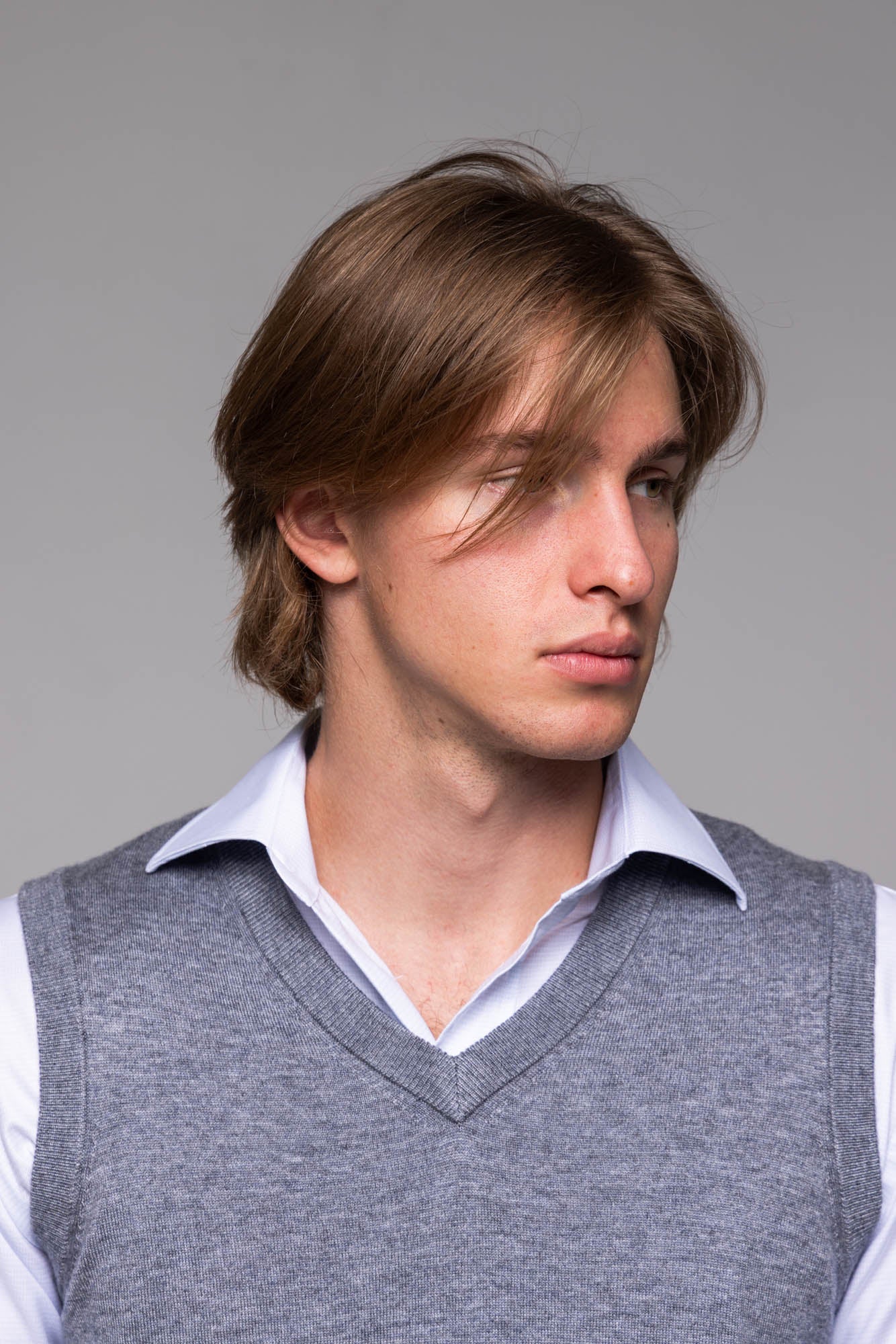 Grey knitted vest with V-neck