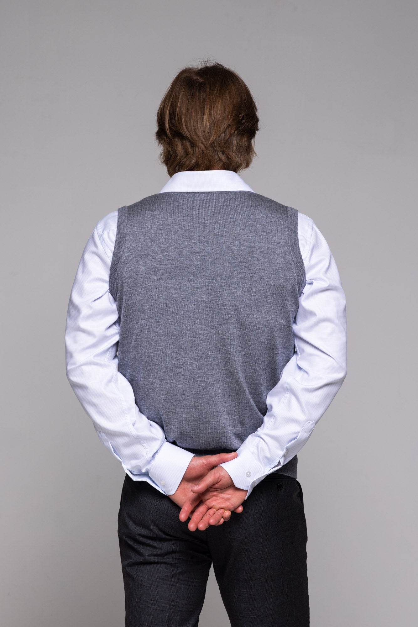 Grey knitted vest with V-neck