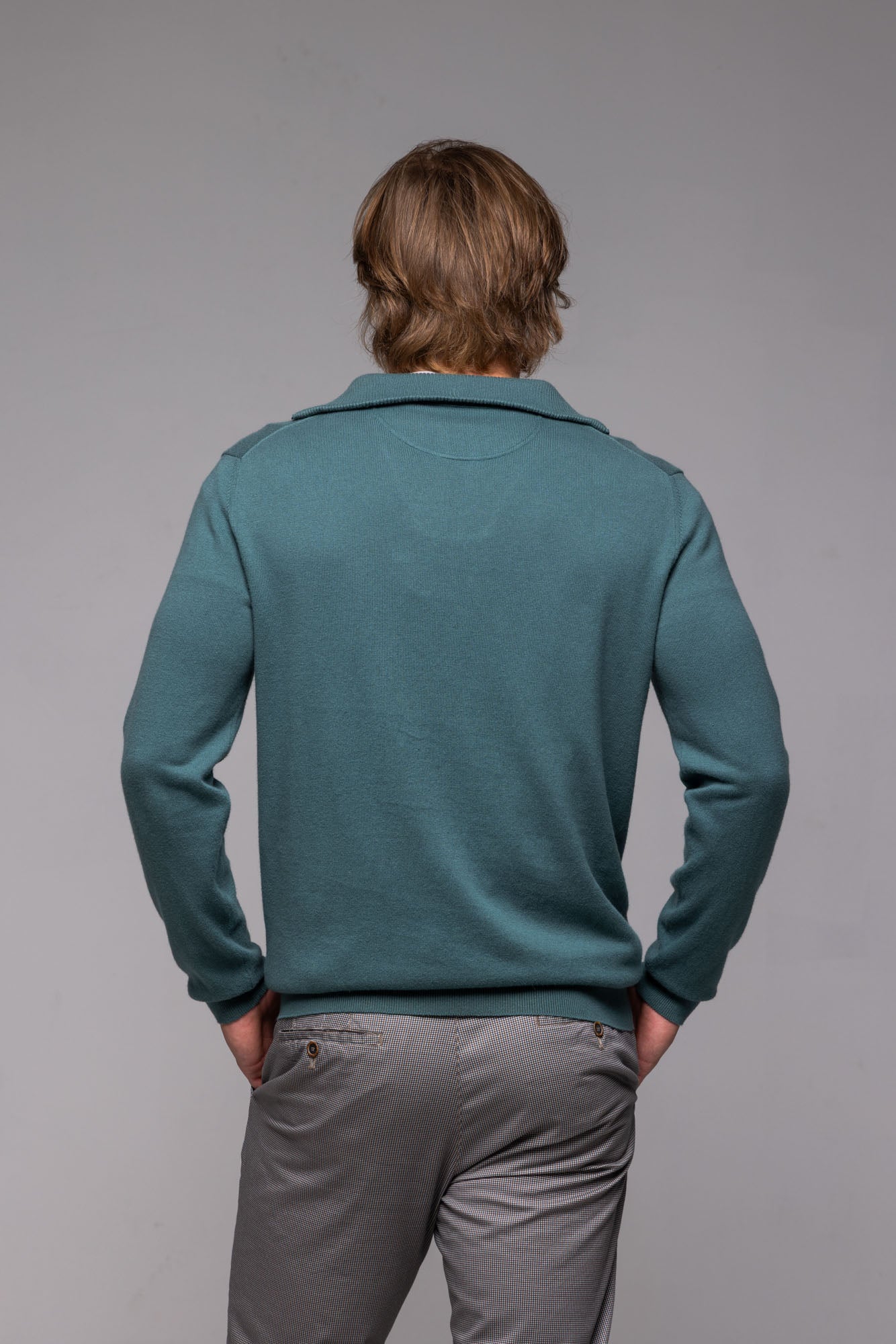 Green zip-up sweater