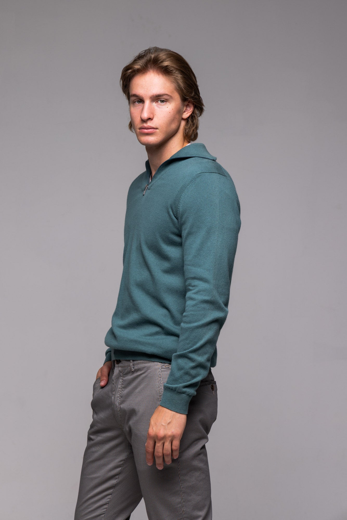Green zip-up sweater