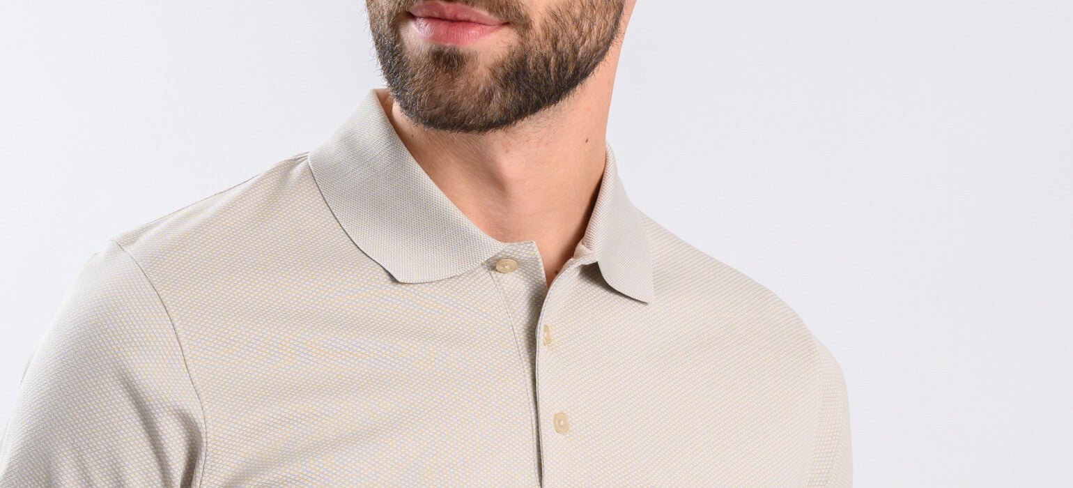 Beige polo shirt with diamonds