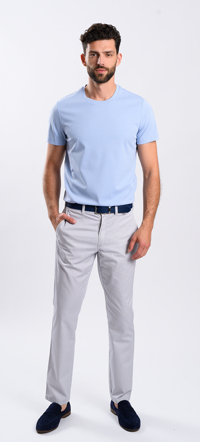 Beige chinos with a rooster print