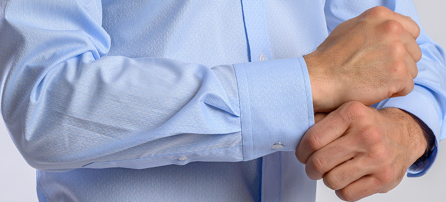 Pale blue slim fit shirt with a subtle wave pattern