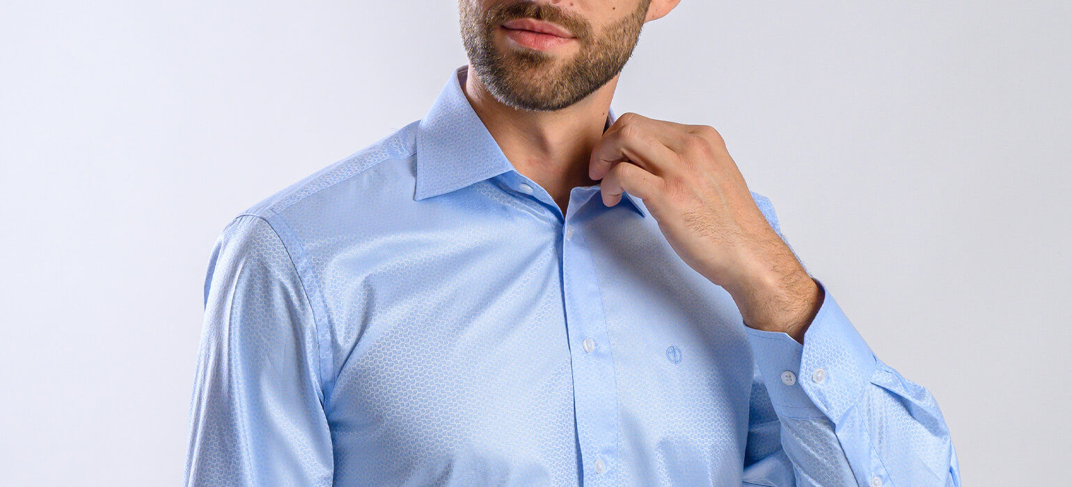 Pale blue slim fit shirt with subtle pattern