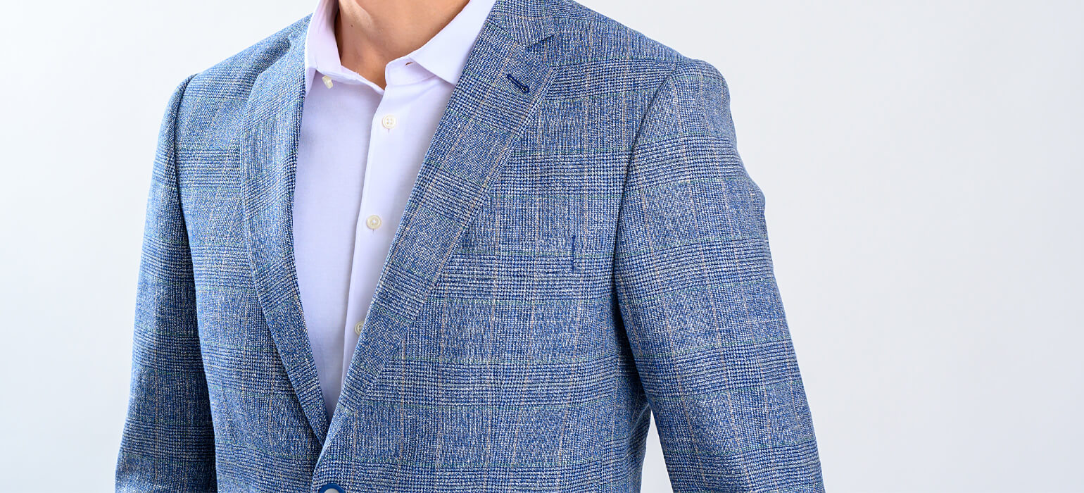 Pale blue blazer with soft brown check