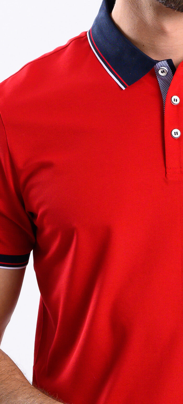 Red polo shirt with navy blue collar