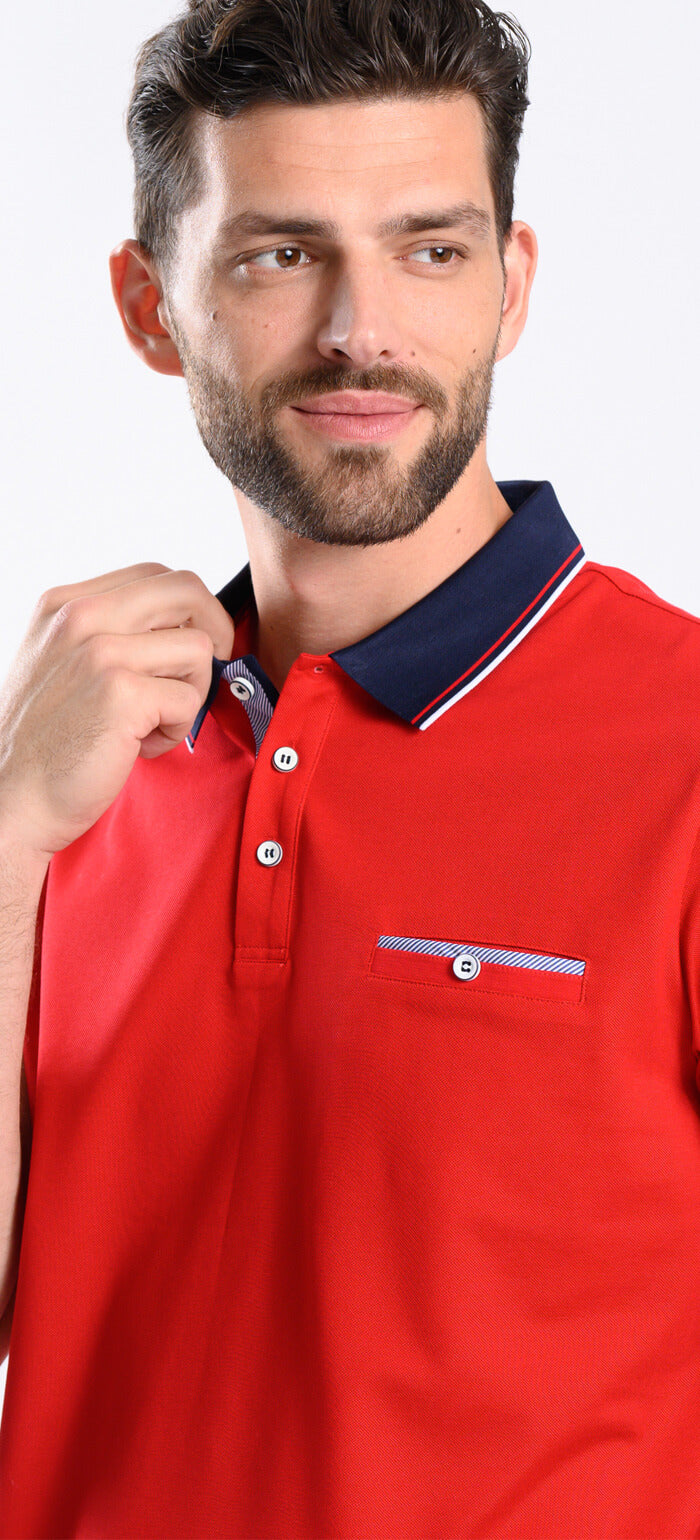 Red polo shirt with navy blue collar