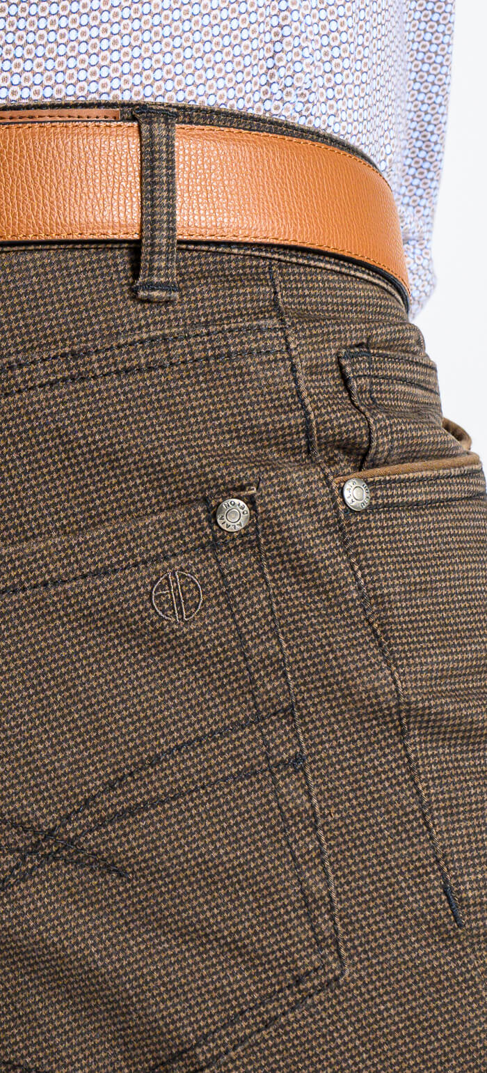Brown casual trousers with a rooster print