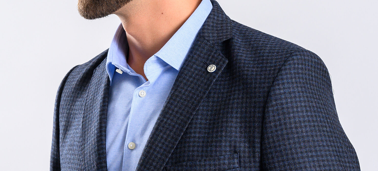 Blue blazer with a small check pattern and a removable insert