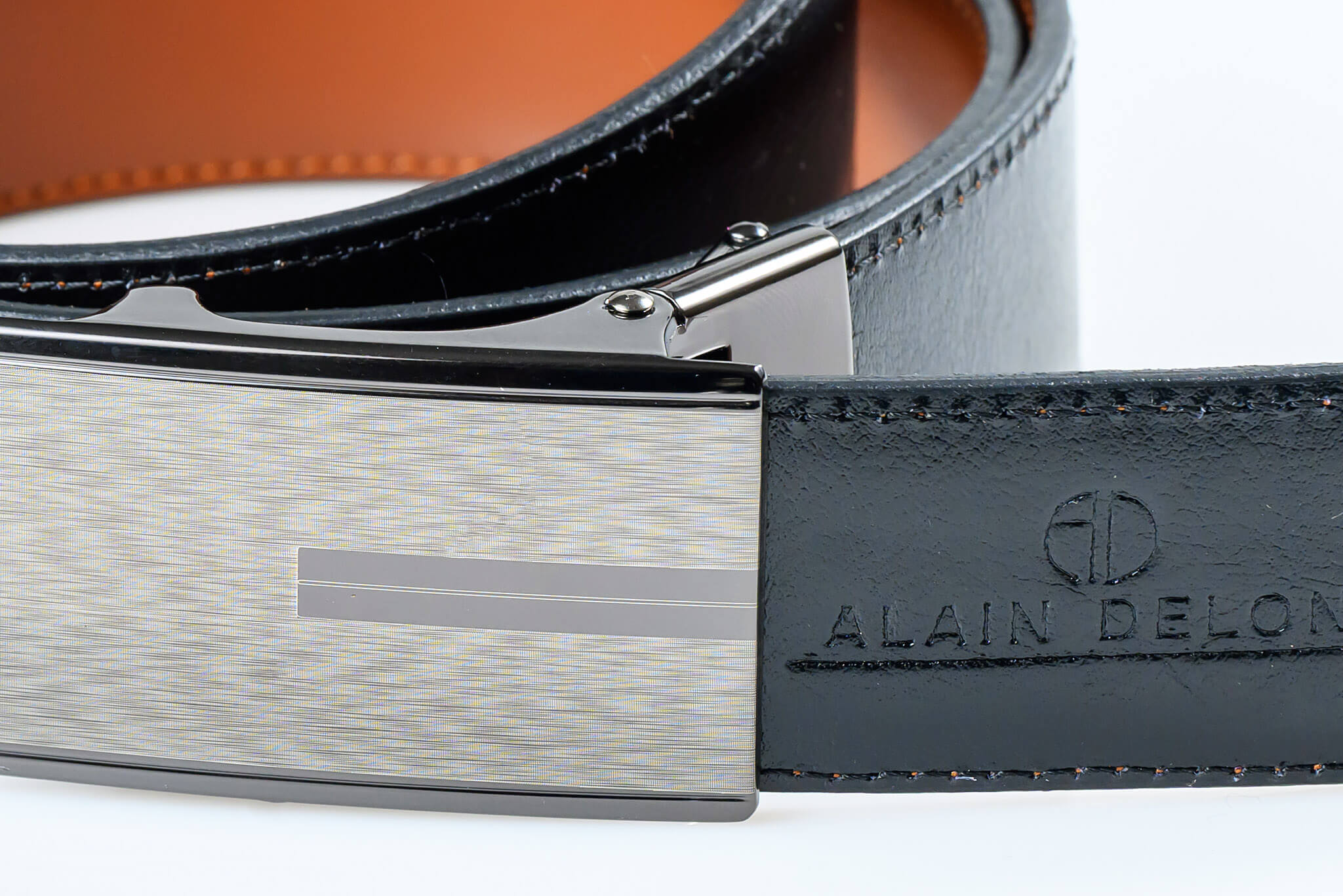 Reversible leather belt with brake buckle