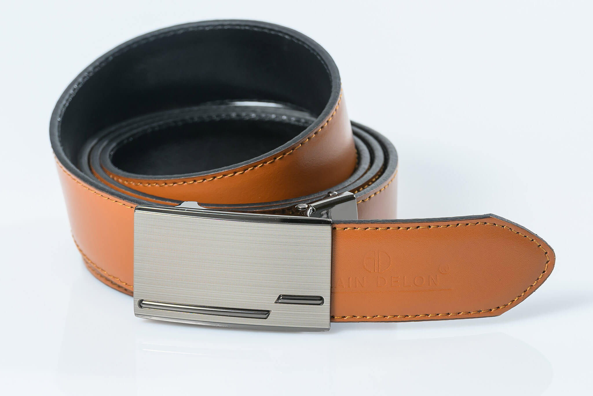 Reversible leather belt with brake buckle