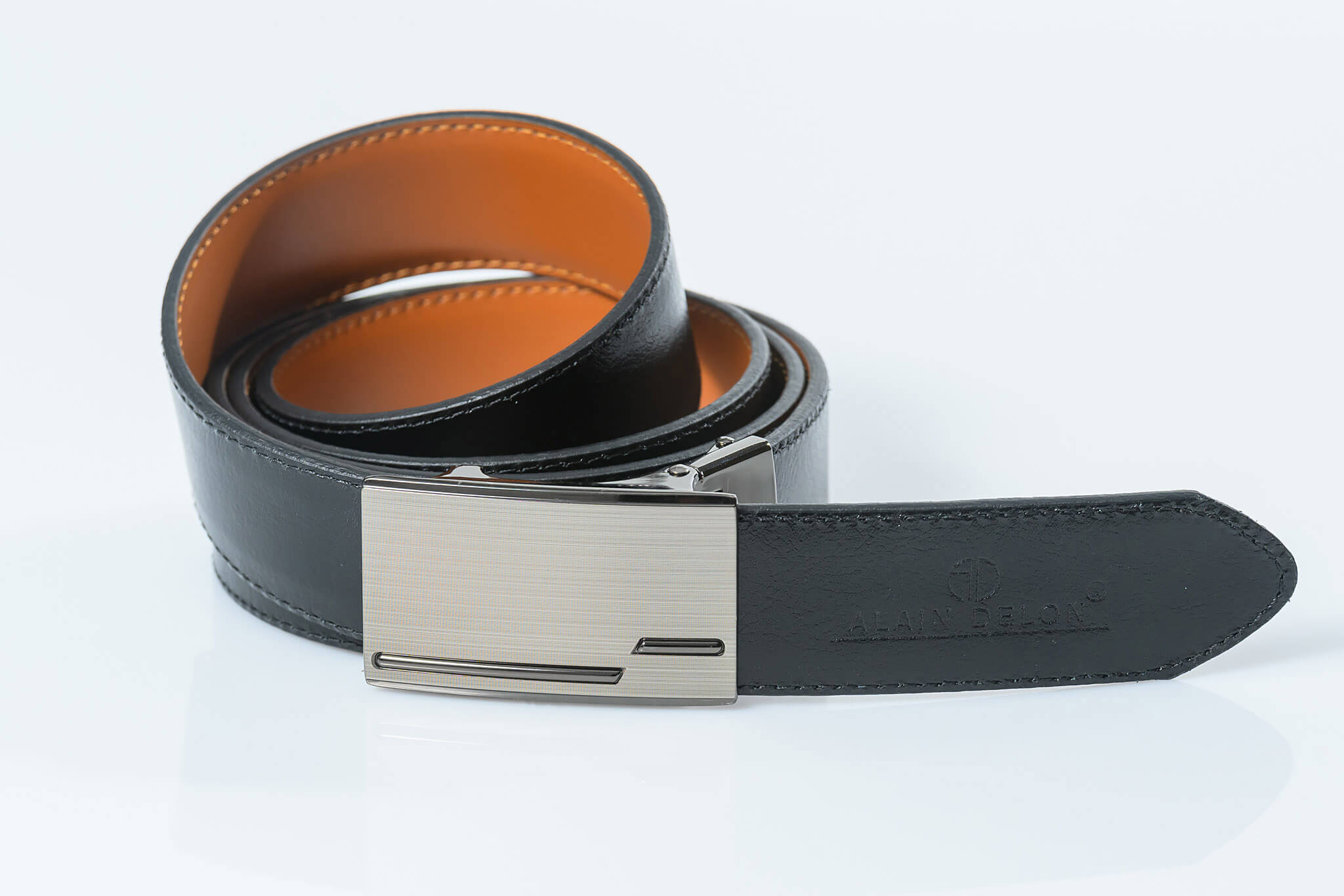 Reversible leather belt with brake buckle