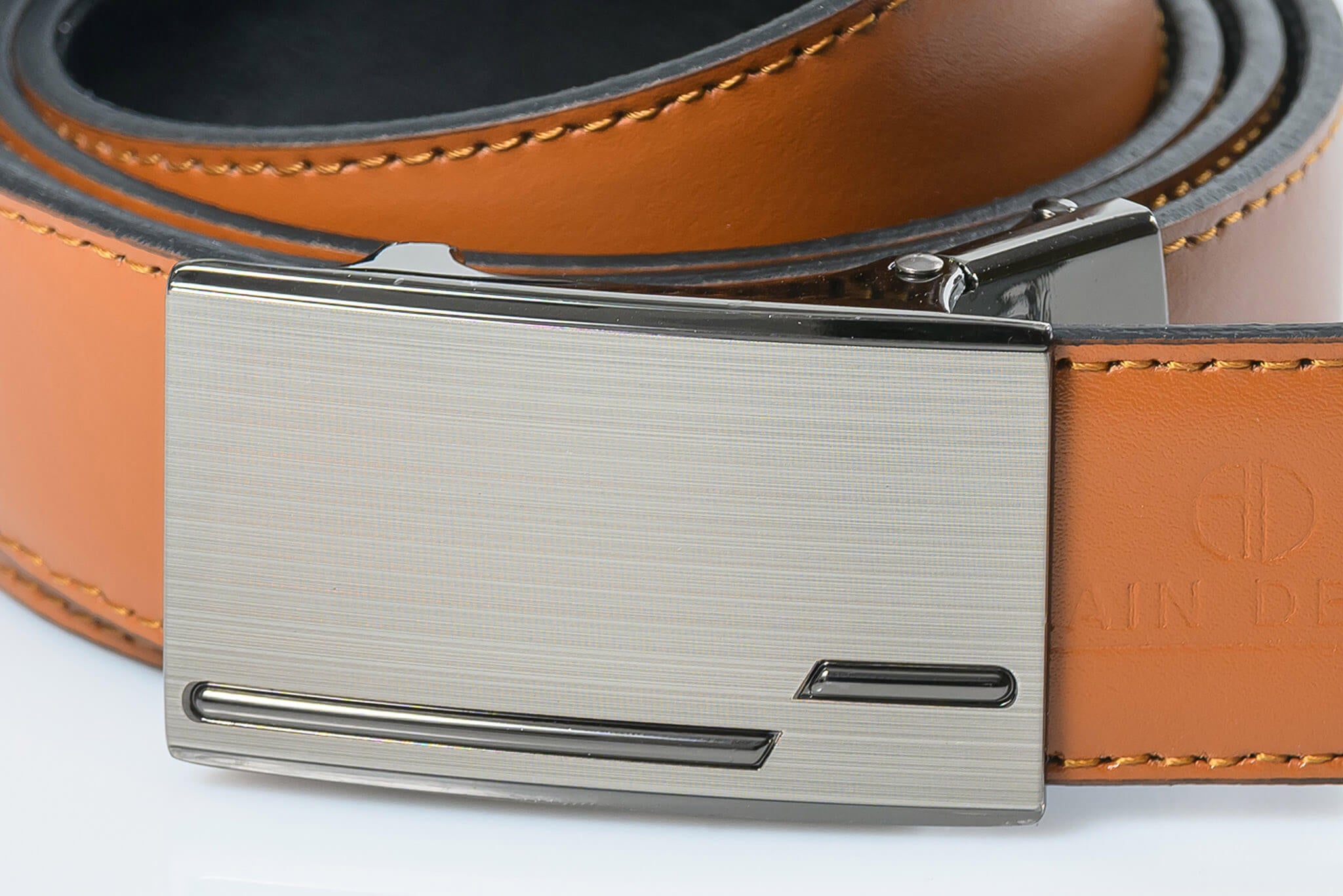 Reversible leather belt with brake buckle