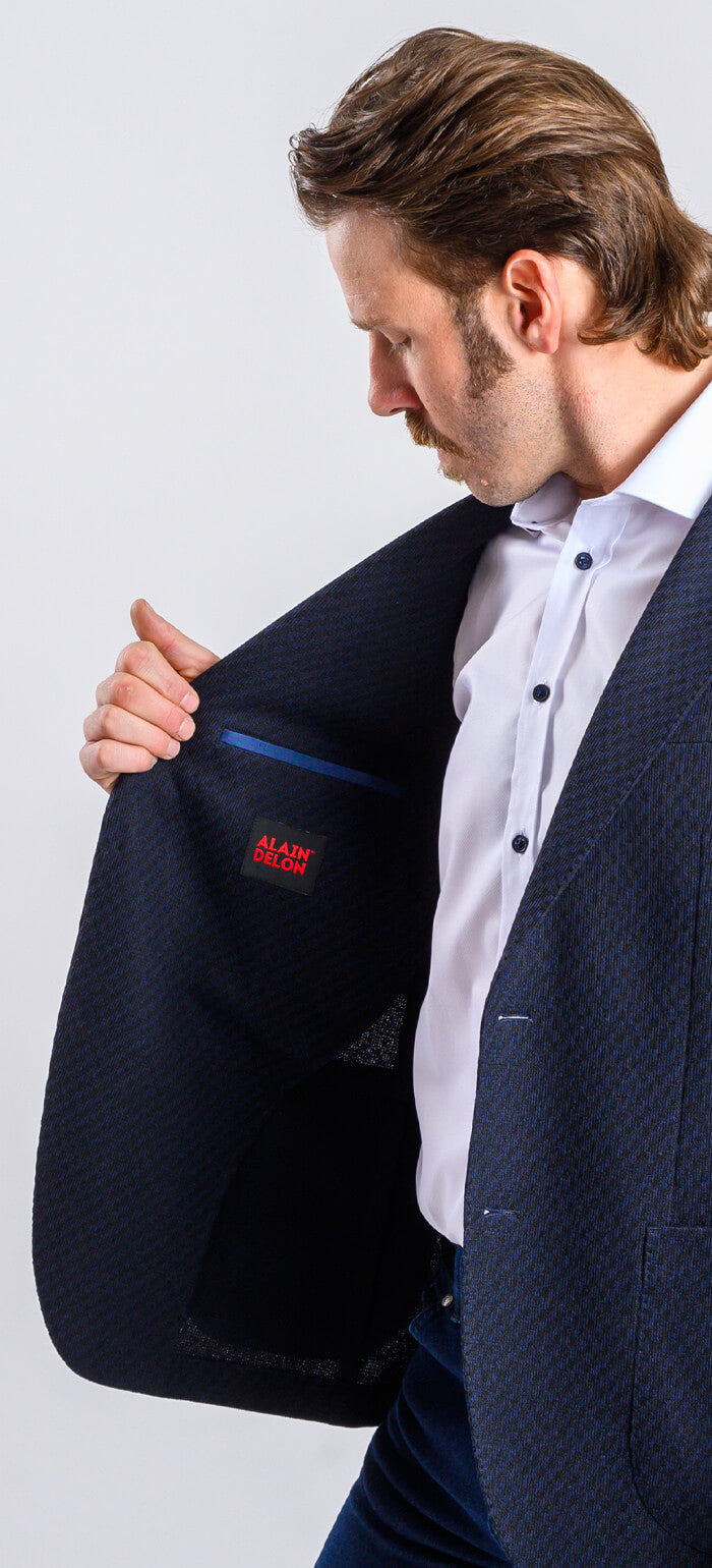 Navy blue jacket with a subtle pattern, size XL