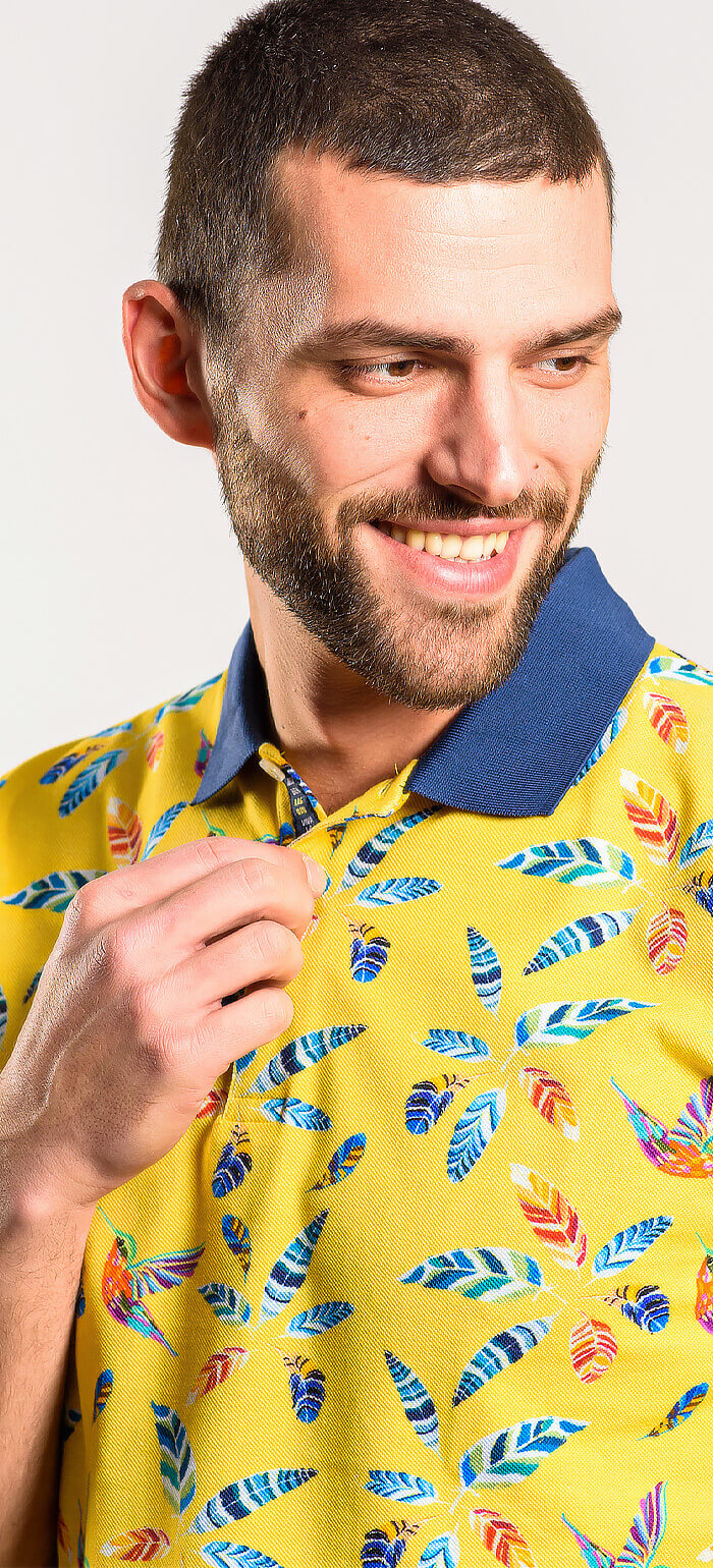 Yellow polo shirt with a bold pattern